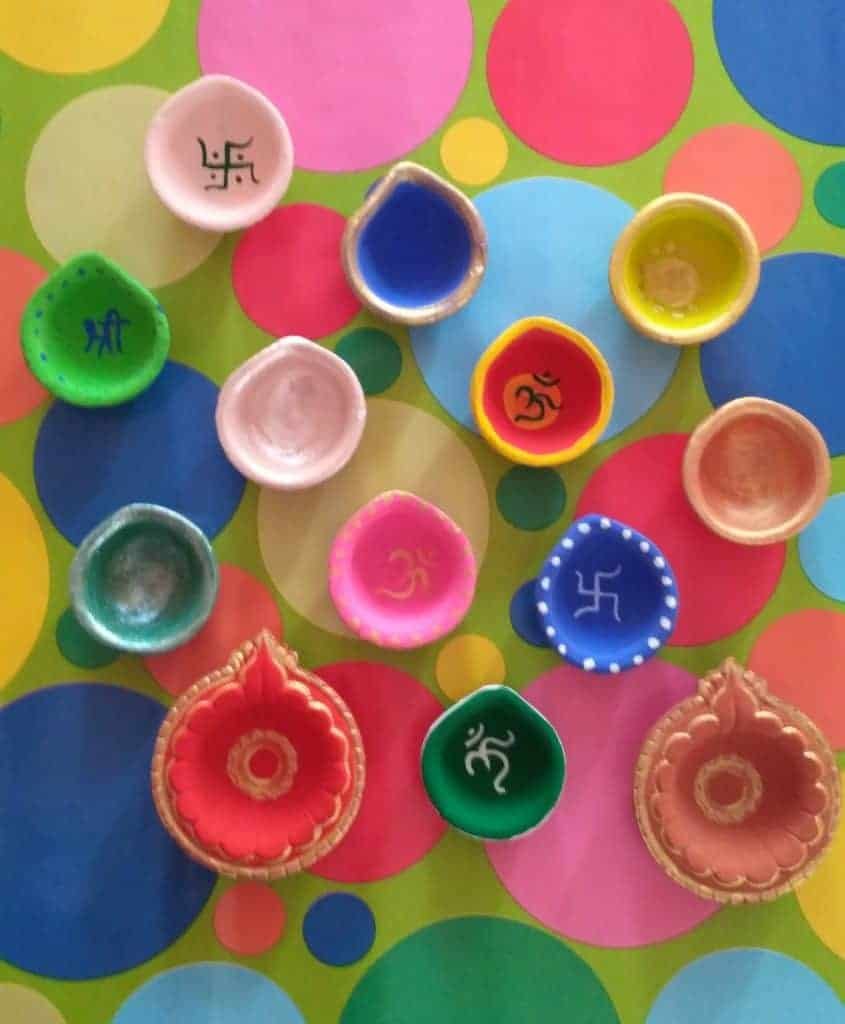 diya painting with poster colours or acrylic colours.  How to paint your own Diyas this Diwali. diwali gift ideas for kids