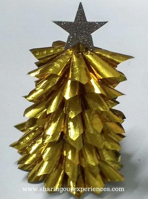 christmas tree with gold papercones