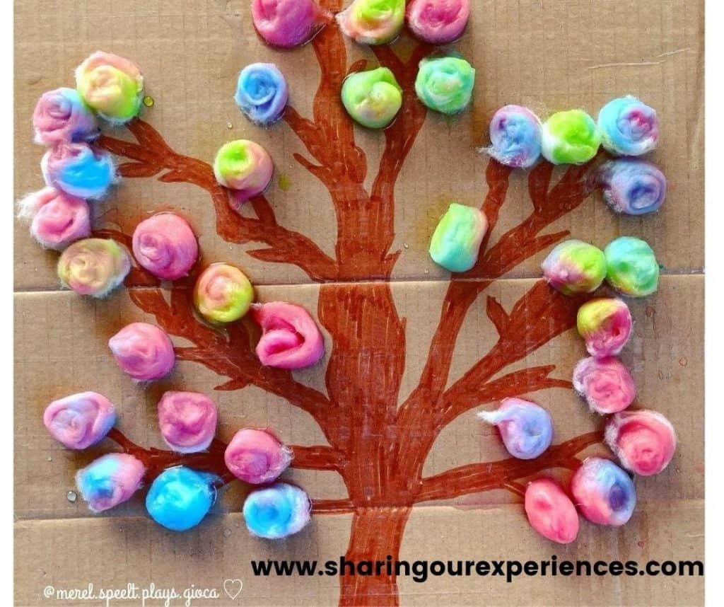 colorful tree made using cotton balls for toddlers. spring craft for preschoolers and kindergartens for theme based activity for school projects and book reading